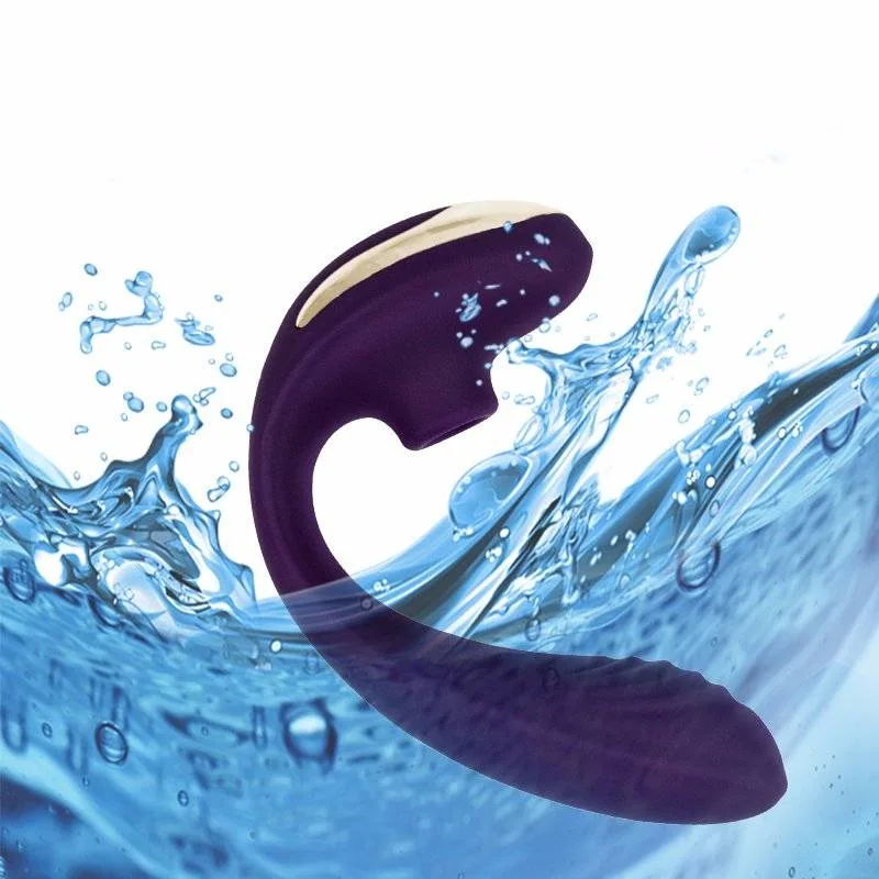 Vibrador sugador de clitóris roxo à prova d'água sob jato de água
