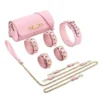 Kit de bondage rosa com bolsa, algemas, tornozeleiras e coleira com guia