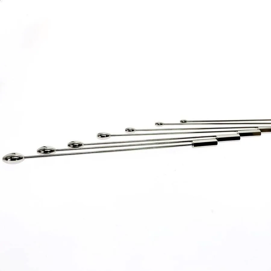 Hastes de sonda uretral alinhadas mostrando as espessuras de 6 a 12 mm
