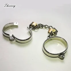 Algemas de tornozelo Thierry de aço inox polido com cadeados de latão e corrente