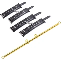 Spreader bar Thierry dourada com quatro algemas de couro pretas