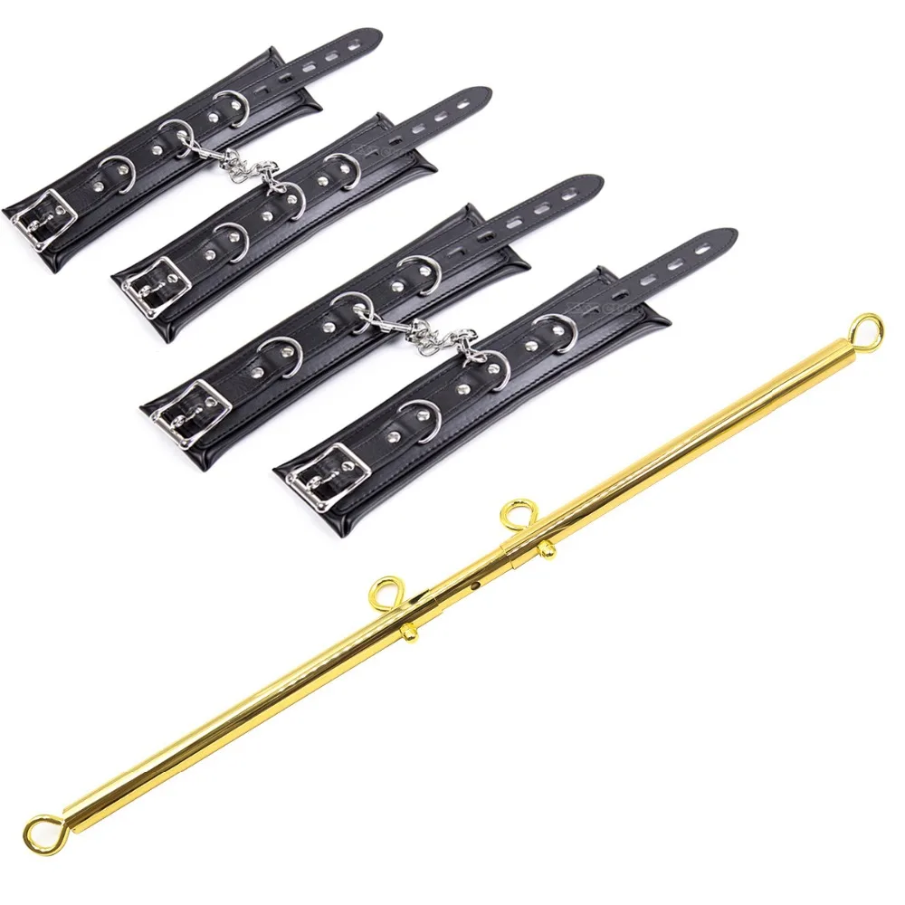 Spreader bar Thierry dourada com quatro algemas de couro pretas