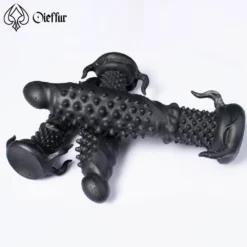 Monster dildo tentáculo deitado mostrando a ventosa e os tentáculos da base