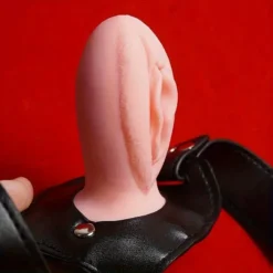 Detalhe da vagina realista de silicone da mordaça