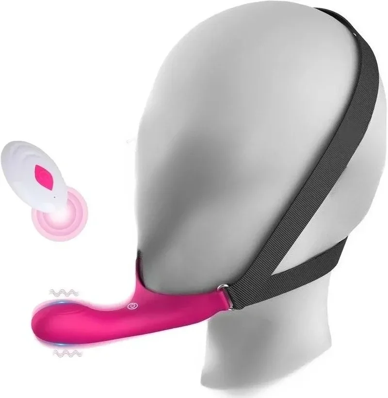 Vibrador rosa com arnês de queixo preso à cabeça por cintas elásticas, ao lado do controle remoto