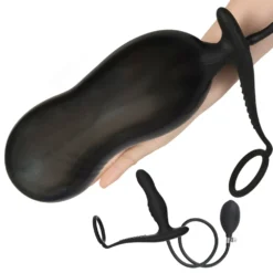 Plug anal inflável preto inflado na mão com anel peniano e bomba