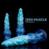Consolo Egg Muscle monster dildo azul degradê com ventosa, de pé e deitado