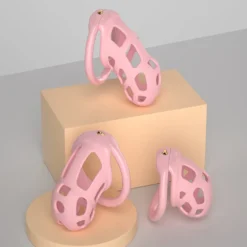 Três tamanhos da gaiola de castidade rosa de silicone