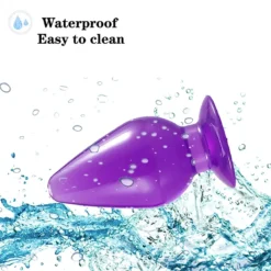 Plug anal cônico roxo translúcido sob água, mostrando que é à prova de água e fácil de limpar