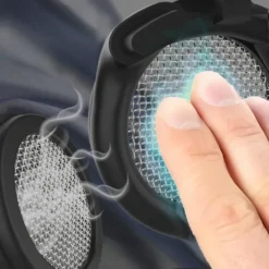 Close da tela metálica respirável da gaiola de castidade micro