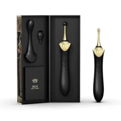 Vibrador de clitoris premium preto com ponta dourada e cabecas intercambiaveis na caixa
