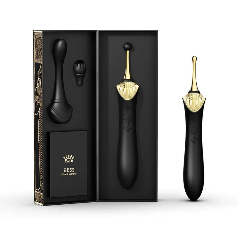 Vibrador de clitoris premium preto com ponta dourada e cabecas intercambiaveis na caixa