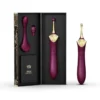 Vibrador de clitoris premium roxo com ponta dourada e cabecas intercambiaveis na caixa de presente