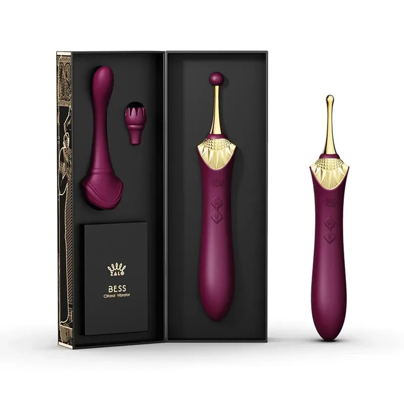 Vibrador de clitoris premium roxo com ponta dourada e cabecas intercambiaveis na caixa de presente