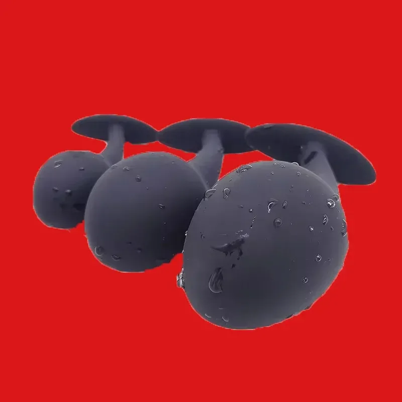Base em T curvada do plug anal Black Drop, que impede a peça de entrar