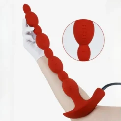 Plug anal longo Colosso de 45 cm com contas texturizadas ao lado do braço para escala