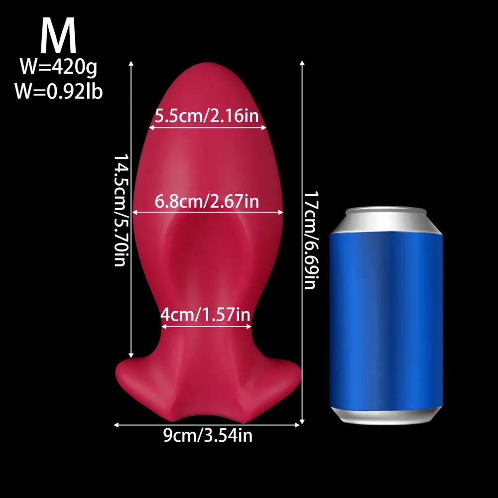 Plug anal ovo Ruby Egg tamanho M, 17 cm e 6,8 cm de diâmetro, ao lado de uma lata